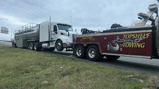 Topshelf Towing Inc